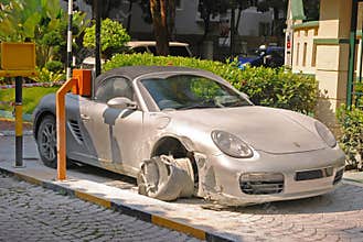 Fancy sport car caught fire & burnt down just in front of the guard house entrance