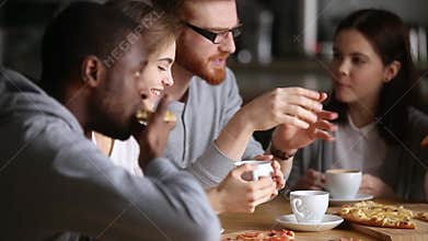 Multinational friends or colleagues eating pizza drinking coffee or tea