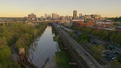 The railroad line travels along the riverfront heading into Richmond Virginia
