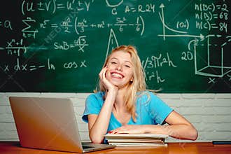 College students studying. Education. Student girl reading a presentation on laptop. Education study abroad. Female