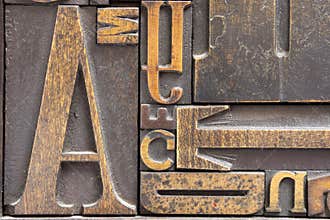 Antique printing block letters