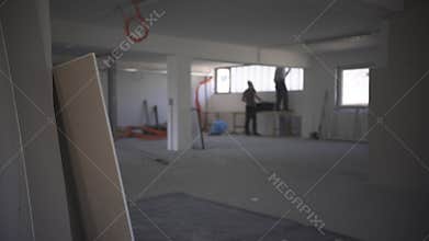 Interior empty office light room with white wallpaper without furniture in a new building renovation or under