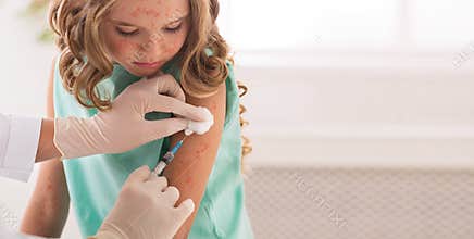Vaccination Concept. Girl Receiving Measles Vaccine In Clinic
