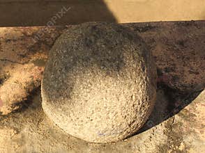 An aged cannon stone ball