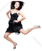 Beautiful Chinese woman jumping up in excitement