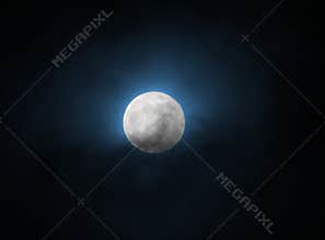 Blue glowing full moon at supermoon 31 january 2018 in a black sky