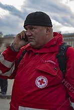Kyiv, Ukraine, Independence Square, September 9: The Volunteer of the Red Cross stands near the building of the National