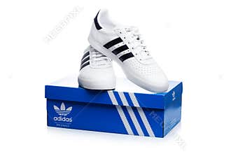 LONDON, UK - JANUARY 02, 2018: Adidas Originals shoes on top of blue box.