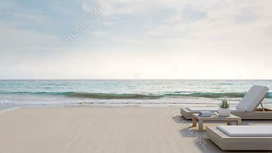 Sea view terrace and beds in modern luxury beach house with blue sky background, Lounge chairs on wooden deck at vacation home