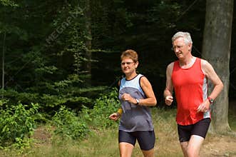 Senior couple running