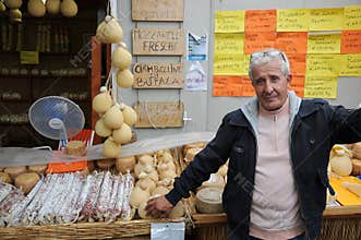 Man sells cheese and salami