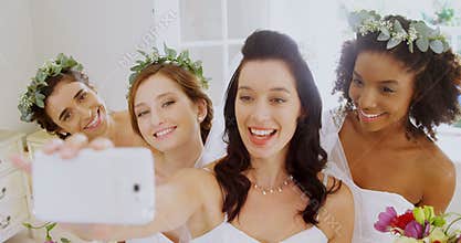 Bridesmaids and bride making pout while taking a selfie4K 4k