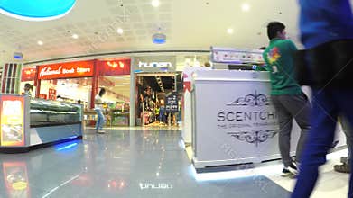 Modern indoor shopping mall stalls. tracking shot