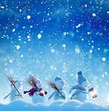 Many snowmen standing in winter Christmas landscape.