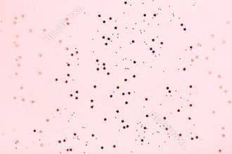 Pink background with red star glitter.