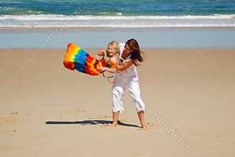 Mom, daughter, beach fun