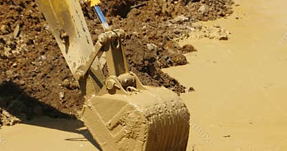 4k closeup excavator working & dumper truck on construction site,china.