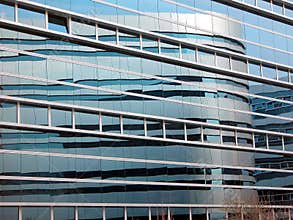 Modern office building and reflections