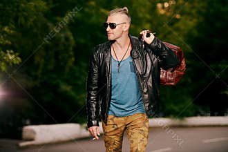 Brutal man in leather jacket