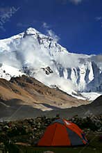 Mount everest with a red tent in front