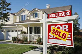 Sold Foreclosure Home For Sale Sign and House