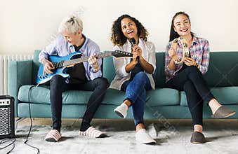 Group of people enjoying music instruments