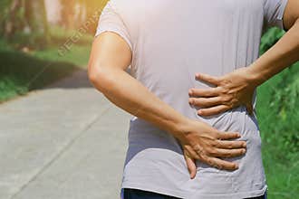 man runing with back pain