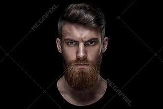 Portrait of single bearded handsome young caucasian man