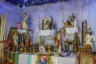 Brazilian religious altar mixing elements of umbanda, candomblÃ© and catholicism