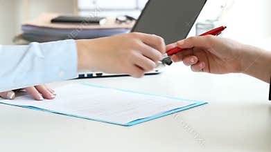 Businesswomen handshaking closing a deal