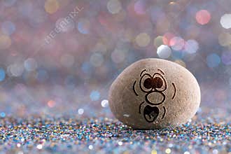 The surprised stone emoji