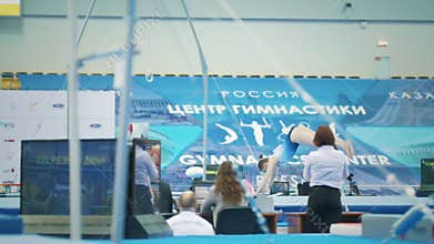 KAZAN, RUSSIA - APRIL 19, 2018: All-Russian gymnastics championship -Young woman gymnast performing at the studium
