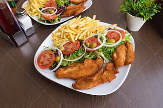 Breaded chicken breast dish