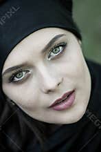 Portrait of a beautiful muslim woman. Young arabian woman in hijab