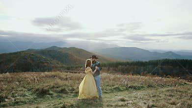 Fall on Max Patch Mountain Appalachian Mountains, Tennessee & North Carolina, young couple, woman in yellow dress