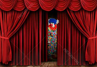 Clown on Stage Behind Curtain