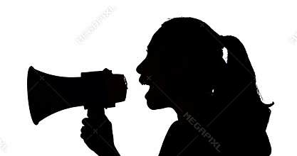 Silhouette of woman shouting on the megaphone