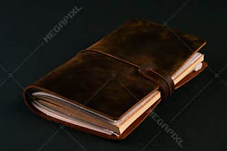 Handmade paper diary notebook in brown leather cover