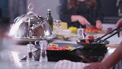 Young boys and girls prepare delicious food and cocktails for a friendly party 04