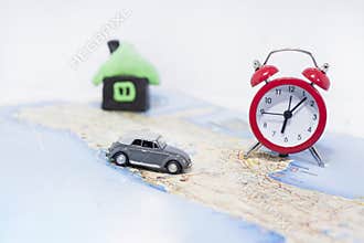 Abstract idea of rent a car. Small car on map. Abstract travel photo