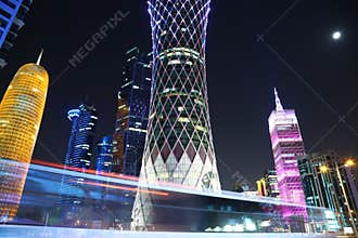 Night road traffic in financial centre in Doha, Qatar