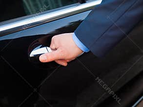 Hand opening limousine door