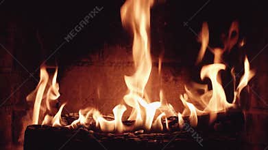 close up cozy view stone fireplace fire crackling wood with sparks