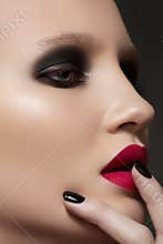Model with fashion make-up, manicure & vinous lips