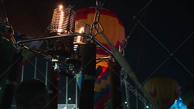 Russia, Sochi - May 24, 2019: launching balloons to sky in night, many of hot air balloons are preparing to fly