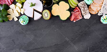 St Patricks Day charcuterie top border against a slate background