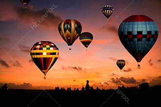 Balloon race at sunrise