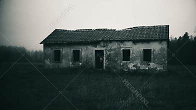 Horror abandoned ghost house in the foggy forest