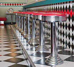 Counter Stools in a row at a 50's style diner