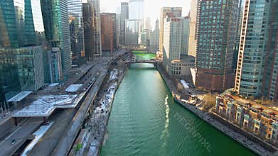 Aerial drone shot of downtown Chicago by the river during early spring
